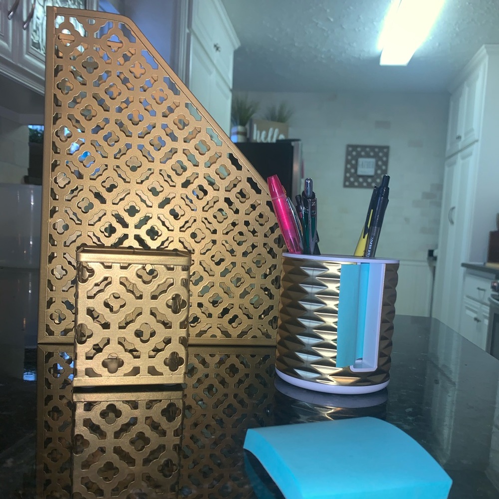 A three piece gold office set